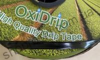 Крапельна стрічка Oxi Drip (Корея) 8 mil / 10 см, водовилив 1,5 л / год, щільова, 1000 м